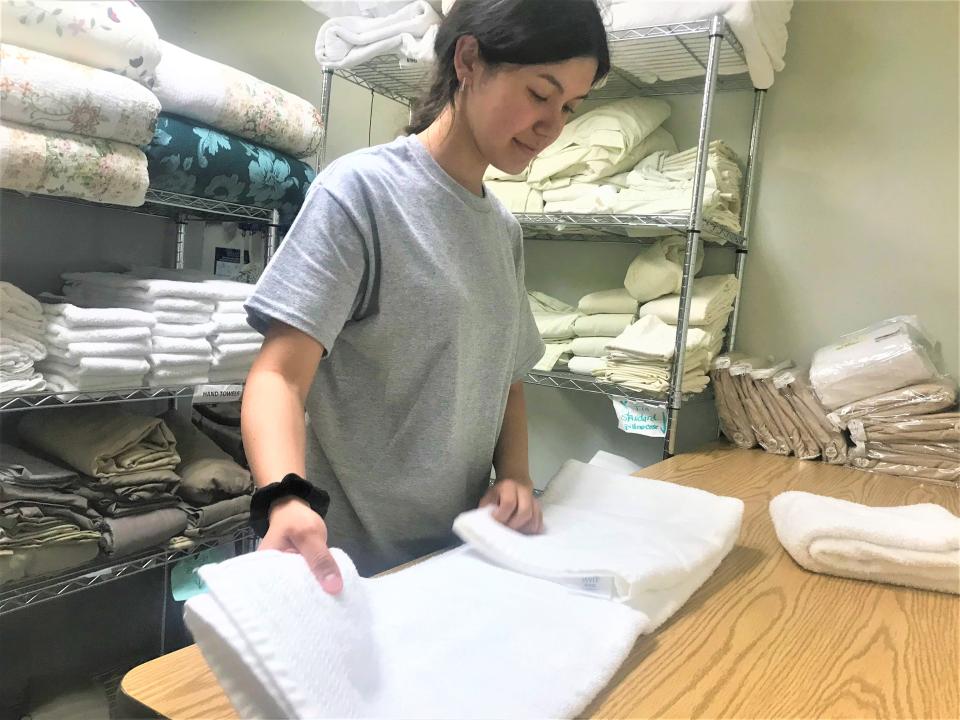 Maya, a J-1 Visa Exchange student from Kazakhstan, works at Our Guest Inns & Suites in Port Clinton this summer. Ohio hopes to rebound this year with its J-1 student numbers, which are crucial to helping Ottawa County and other areas' hospitality industry during the busy summer tourism season.