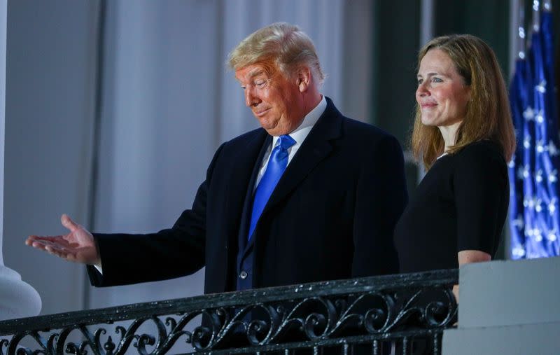 Judge Amy Coney is sworn in to serve as an associate justice of the U.S. Supreme Court at the White House in Washington