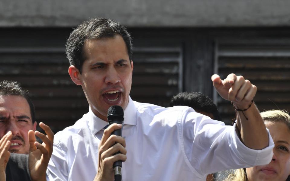 Juan Guaido, the head of Venezuela's national assembly, has been recognised by the US as the country's official leader - AFP