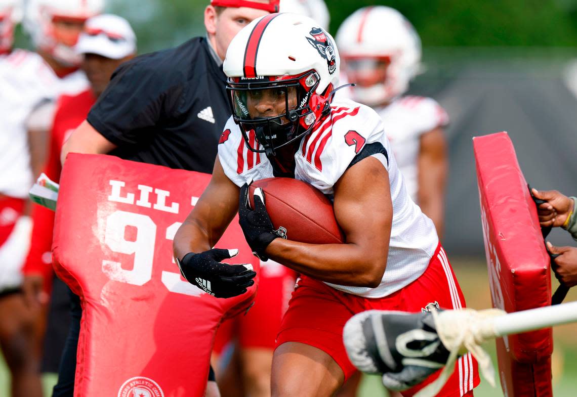 N.C. State running back Michael Allen (2) runs a drill during the Wolfpack’s first fall practice in Raleigh, N.C., Wednesday, August 2, 2023. Ethan Hyman/ehyman@newsobserver.com