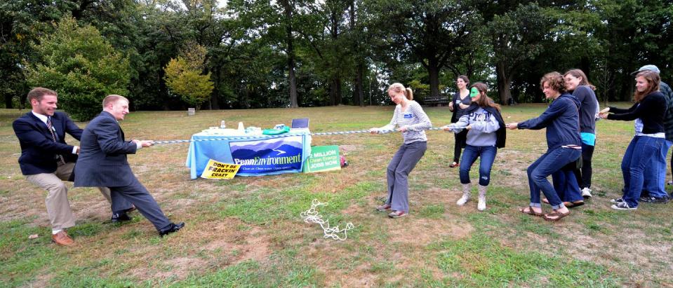 Local groups from Pittsburgh take part in a Frackdown Smackdown tug-of-war between college students representing the "gas industry" and Pennsylvania citizens during a global Frackdown Day Schenley Park in Pittsburgh, Saturday, Sept. 22, 2012. (AP Photo/John Heller)