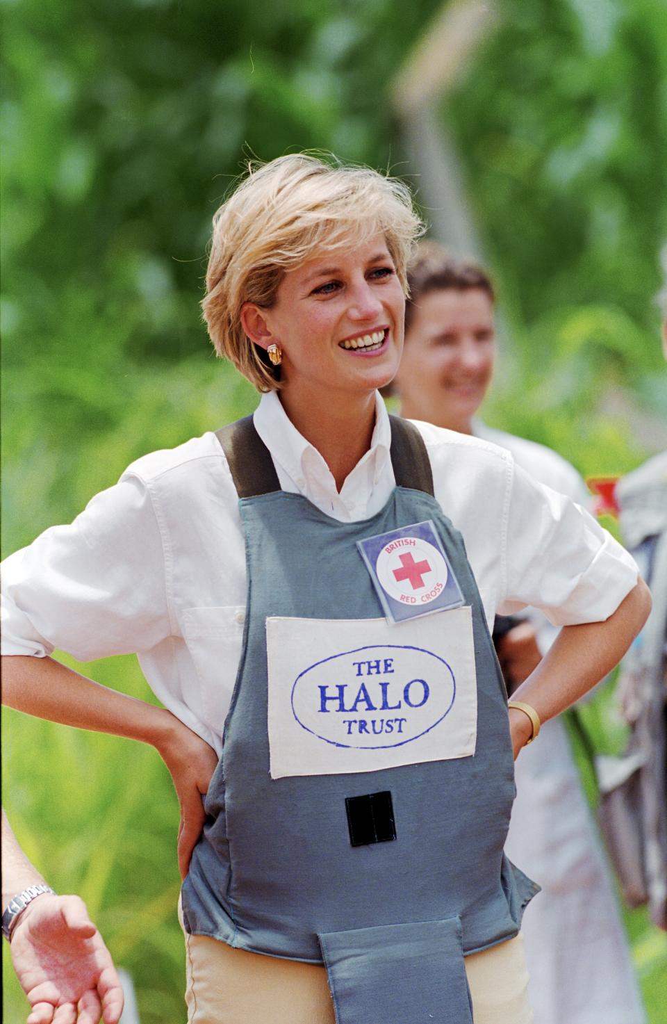 A close-up of Diana, Princess of Wales wearing protective body armour while visiting a minefield in Angola in January 1997 [Photo: Getty]