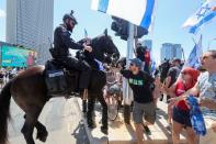 People demonstrate on 'Day of Disruption' in protest against Israel's judicial overhaul, in Tel Aviv