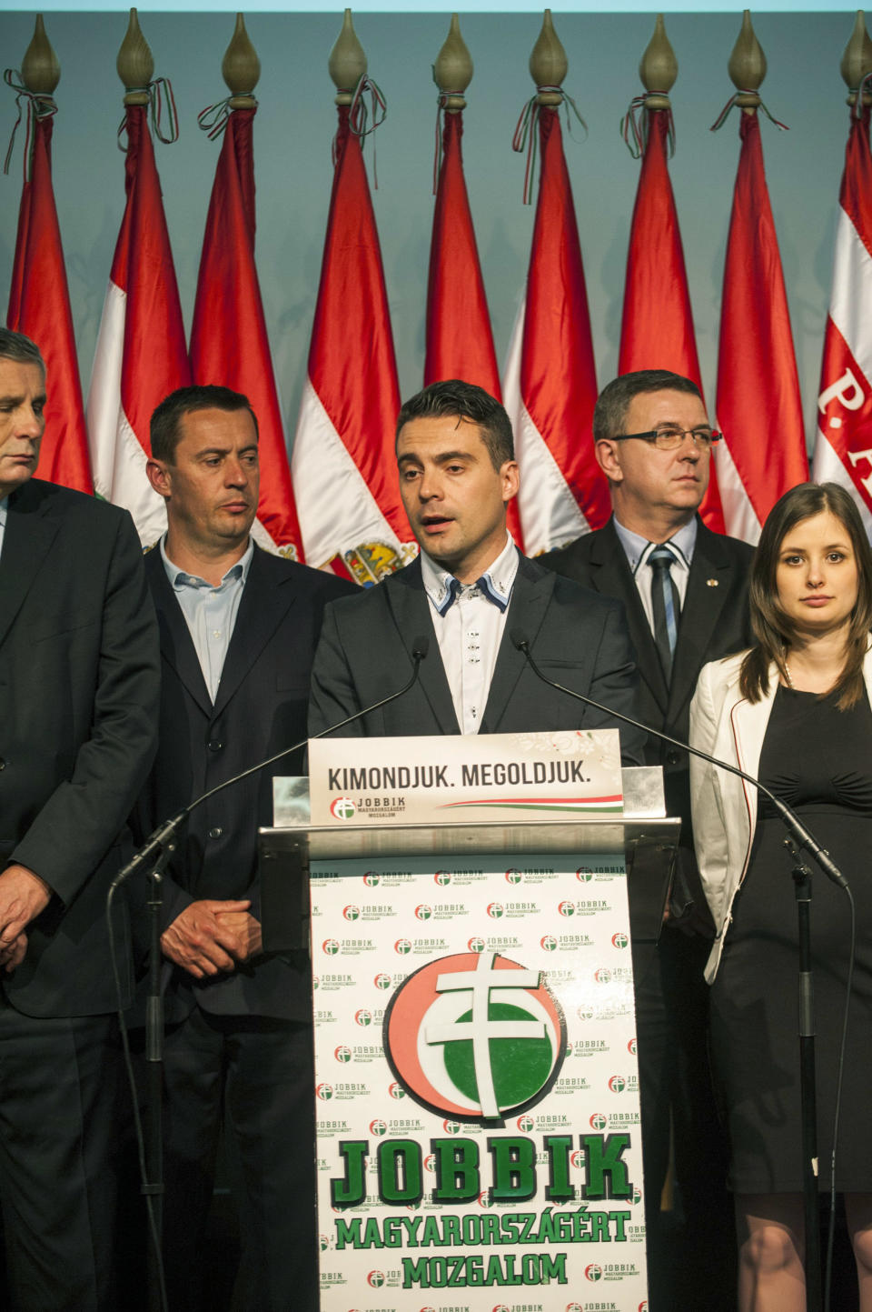 Chairman of the radical nationalist Jobbik party Gabor Vona, center, delivers his speech after the parliamentary elections in the Budapest Congress Centre in Budapest, Hungary, late Sunday, April 6, 2014. (AP Photo/MTI, Janos Marjai)