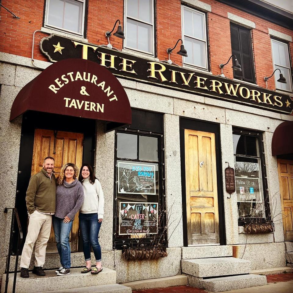 Riverworks Restaurant's previous owner, Jen Jarvis, center, with current owners, Marcy Curtis, right, and Scott Moreau, left.