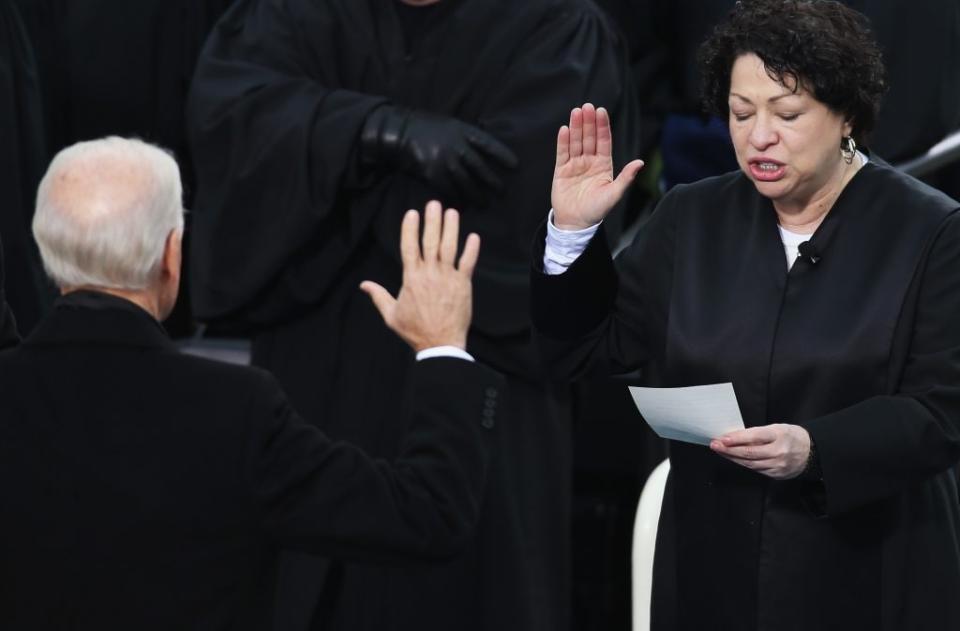 Supreme Court Justice Sonia Sotomayor (R) swears in U.S. Vice President Joe Biden during the public ceremonial inauguration on the West Front of the U.S. Capitol January 21, 2013 in Washington, DC. (Photo by John Moore/Getty Images)