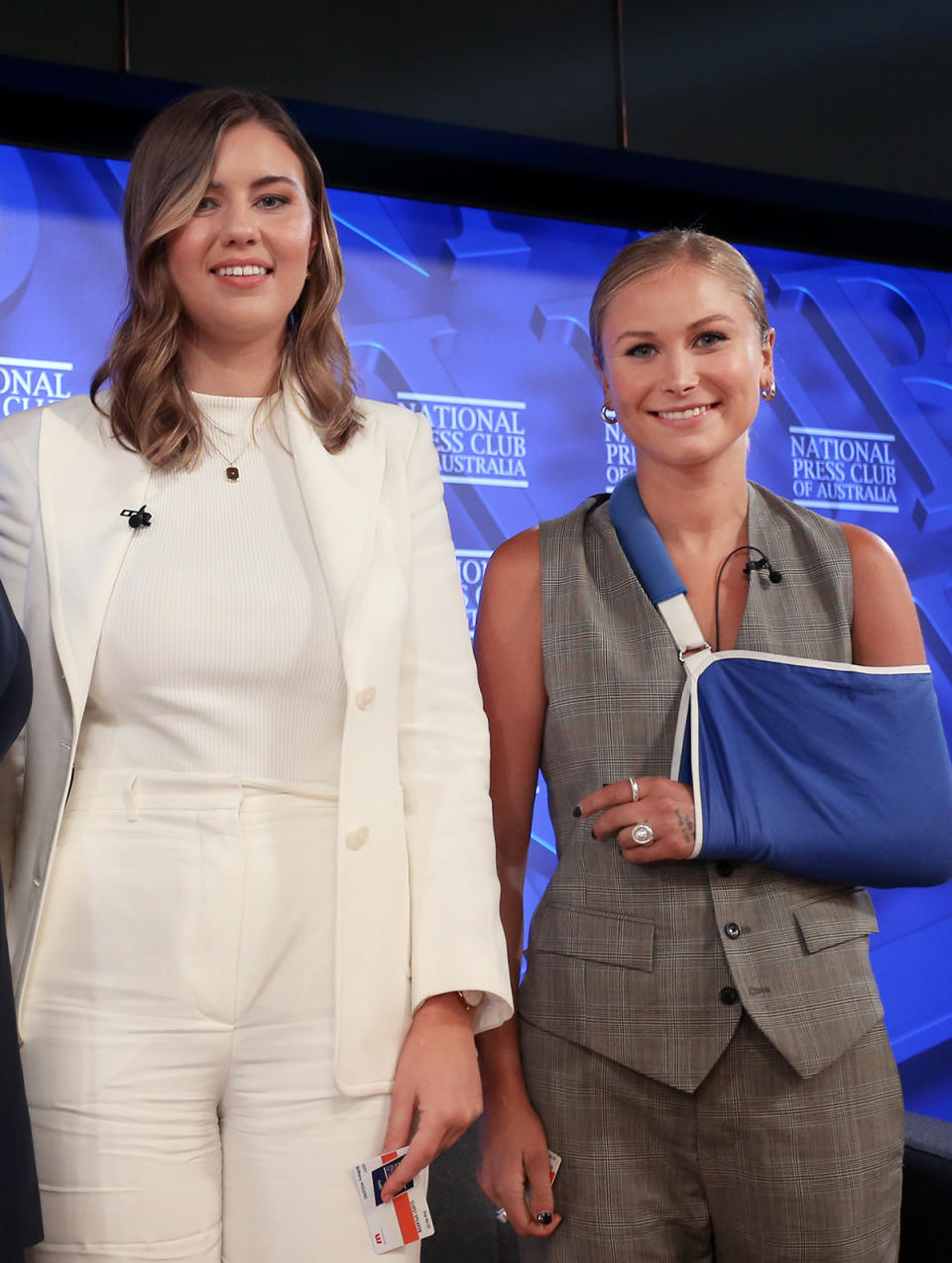 Grace Tame and Brittany Higgins on stage together