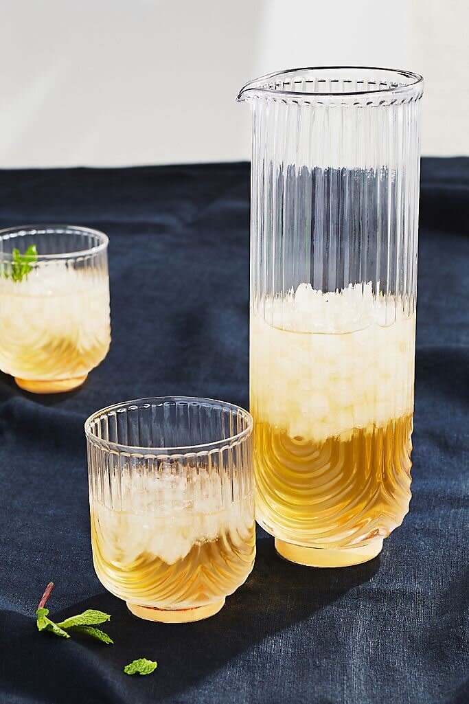 These tumbler glasses features a textured design and gold base. Find them for $38 at <a href="https://fave.co/33QVE5j" target="_blank" rel="noopener noreferrer">Anthropologie</a>.