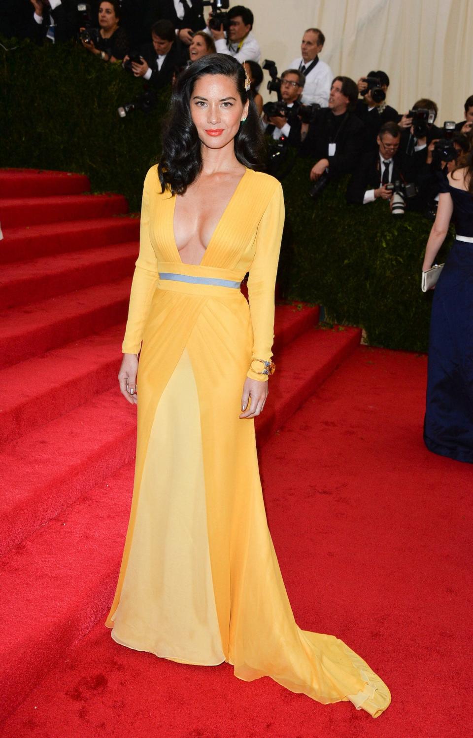 Olivia Munn attends the 2014 Met Gala.