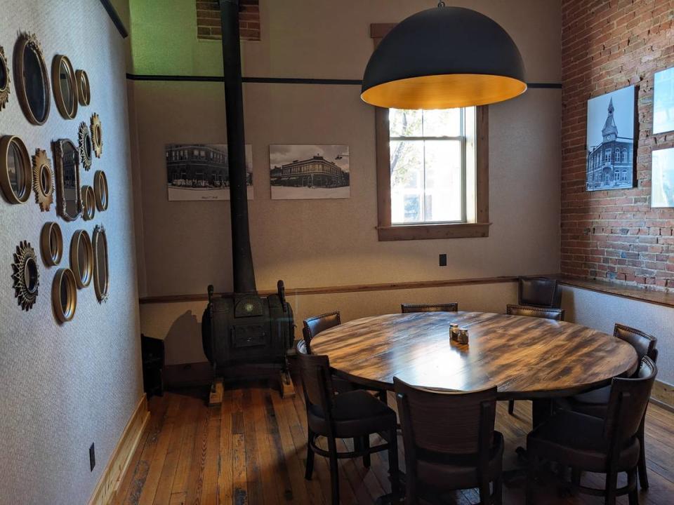 This small private room at 1860 Public House featuring an old woodburning stove is in high demand among customers.