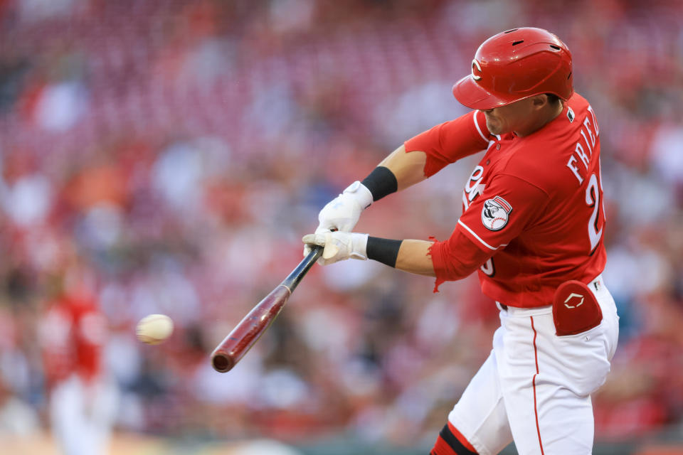 Cincinnati Reds' TJ Friedl hits a single during the first inning of a baseball game against the Chicago White Sox in Cincinnati, Friday, May 5, 2023. (AP Photo/Aaron Doster)