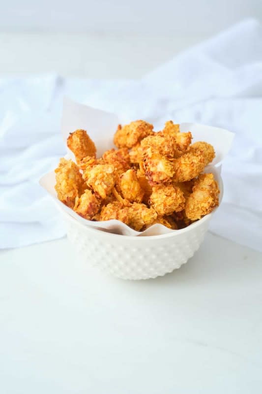<p>Budget Delicious</p><p>This popcorn chicken cooks up in less than 10 minutes and makes a perfect meal, family dinner, snack or appetizer.</p><p><strong>Get the recipe: </strong><a href="https://budgetdelicious.com/air-fryer-popcorn-chicken/" rel="nofollow noopener" target="_blank" data-ylk="slk:Air Fryer Popcorn Chicken;elm:context_link;itc:0;sec:content-canvas" class="link rapid-noclick-resp"><strong>Air Fryer Popcorn Chicken</strong></a></p>