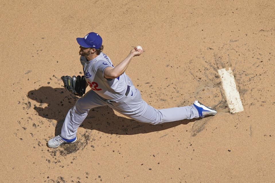 Los Angeles Dodgers starting pitcher Clayton Kershaw throws during the first inning of a baseball game against the Milwaukee Brewers Wednesday, May 10, 2023, in Milwaukee. (AP Photo/Morry Gash)