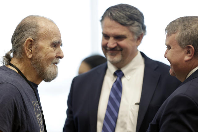 Larry Woodcock, left, talks with defense attorneys James Archibald, middle, and John Thomas after the verdict was read in the murder trial of Lori Vallow Daybell at the Ada County Courthouse in Boise, Idaho, Friday, May 12, 2023. Vallow Daybell was found guilty on all counts. (AP Photo/Kyle Green)