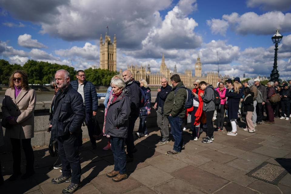 Members of the public continue to wait in line to pay their respects to Queen Elizabeth II as she lays in state within Westminster Hall on September 16, 2022 in London. / Credit: / Getty Images
