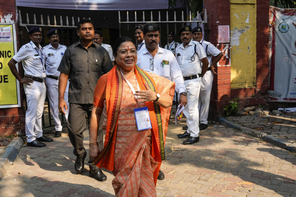 Bharatiya Janata Party candidate Debashree Chowdhury leaves after visiting a counting centre in Kolkata, India, Tuesday, June 4, 2024. India began counting more than 640 million votes Tuesday in the world’s largest democratic exercise, which was widely expected to return Prime Minister Narendra Modi to a third term after a decade in power. (AP Photo/Bikas Das)