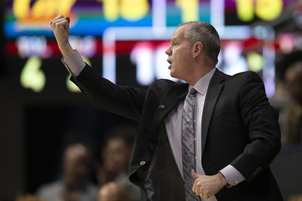 Colorado coach Tad Boyle calls in a play to his team during the first half of an NCAA college basketball game against California, Thursday, Feb. 27, 2020, in Berkeley, Calif. (AP Photo/D. Ross Cameron)