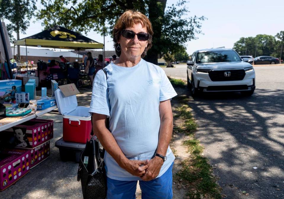 Terry Benhoff poses for a portrait in Selma, N.C. while shopping at the 301 Endless Yard Sale Friday, June 14, 2024.