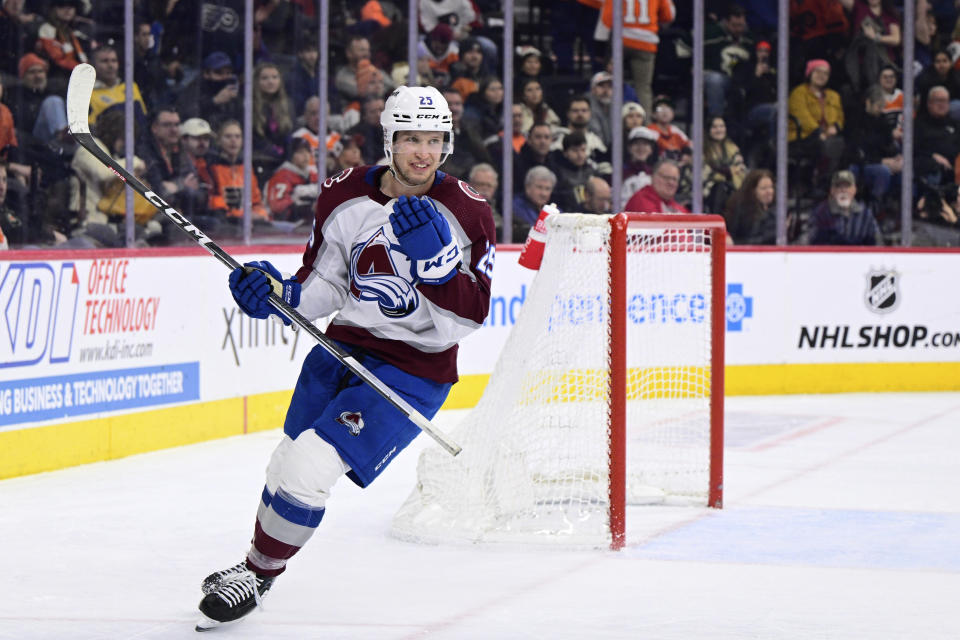 Colorado Avalanche's Logan O'Connor reacts after scoring an empty net goal for a hat trick during the third period of an NHL hockey game against the Philadelphia Flyers, Saturday, Jan. 20, 2024, in Philadelphia. (AP Photo/Derik Hamilton)