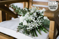 <p>Modody's mom Robin Renee decorated the venue with old driftwood, greenery and flowers — and she also made her new daughter-in-law's bouquet!</p>