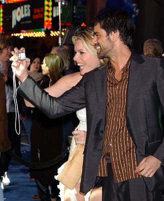 Rebecca Romijn Stamos and John Stamos at the Hollywood premiere of 20th Century Fox's X2: X-Men United