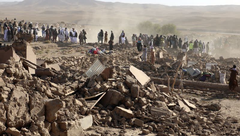 Afghan men search for victims after an earthquake in Zenda Jan district in Herat province, of western Afghanistan, Sunday, Oct. 8, 2023. Powerful earthquakes killed at least 2,000 people in western Afghanistan, a Taliban government spokesman said Sunday. It’s one of the deadliest earthquakes to strike the country in two decades.