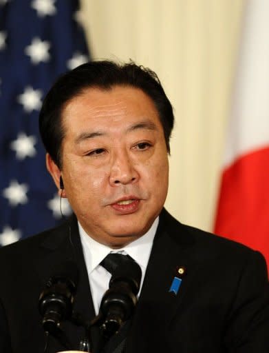 Japan's Prime Minister Yoshihiko Noda answers a question during a joint press conference with US President Barack Obama in the East Room at the White House in Washington