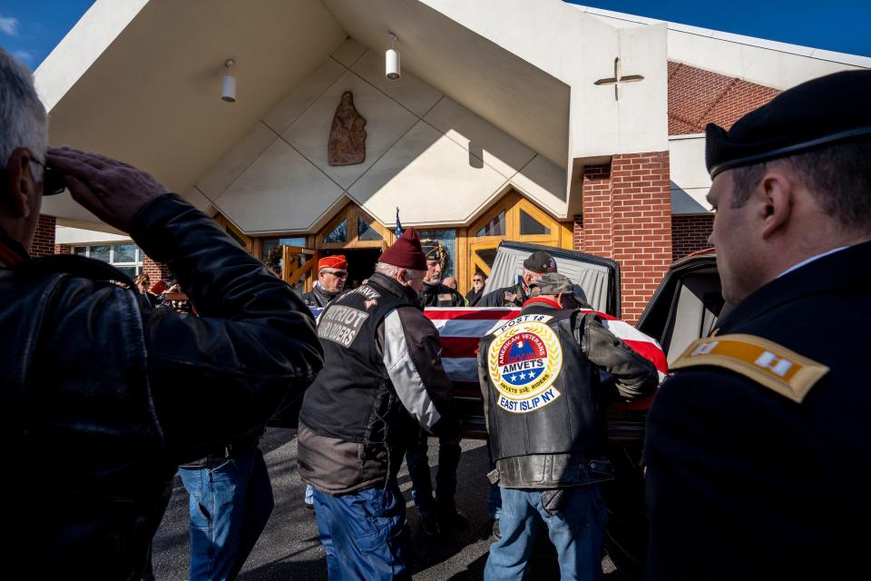 A group of veterans carry a flag-draped casket to the hearse during a funeral mass for Lt. John Heffernan at St. Elizabeth of Hungary RC Church in Wyckoff, NJ on Saturday, November 19, 2022. Heffernan is a WWII U.S. bomber navigator who was shot down in Burma in 1944. Heffernan's remains were identified in 2021 and returned to the U.S. 78 years after his death. 