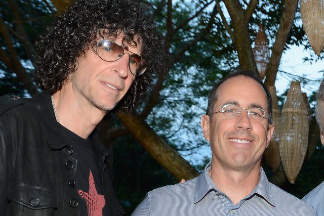 <p>Kevin Mazur/Getty</p> Howard Stern and Jerry Seinfeld