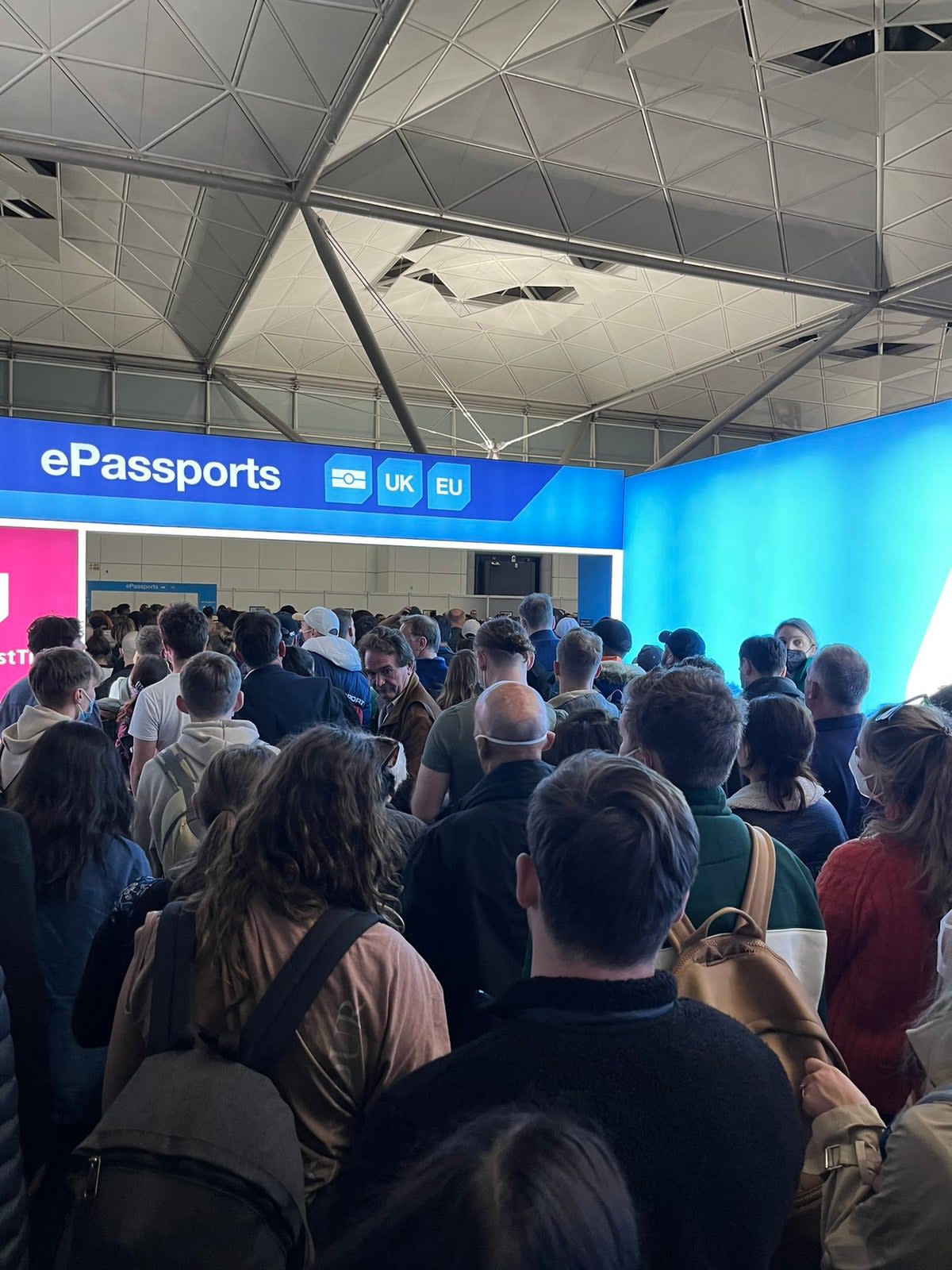 Passengers using e-gates after arriving at Stansted Airport in 2022 (PA Archive)