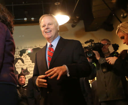 Democratic Alabama U.S. Senate candidate Doug Jones arrives to vote at Brookwood Baptist Church in Mountain Brook, Alabama, U.S. December 12, 2017. REUTERS/Marvin Gentry