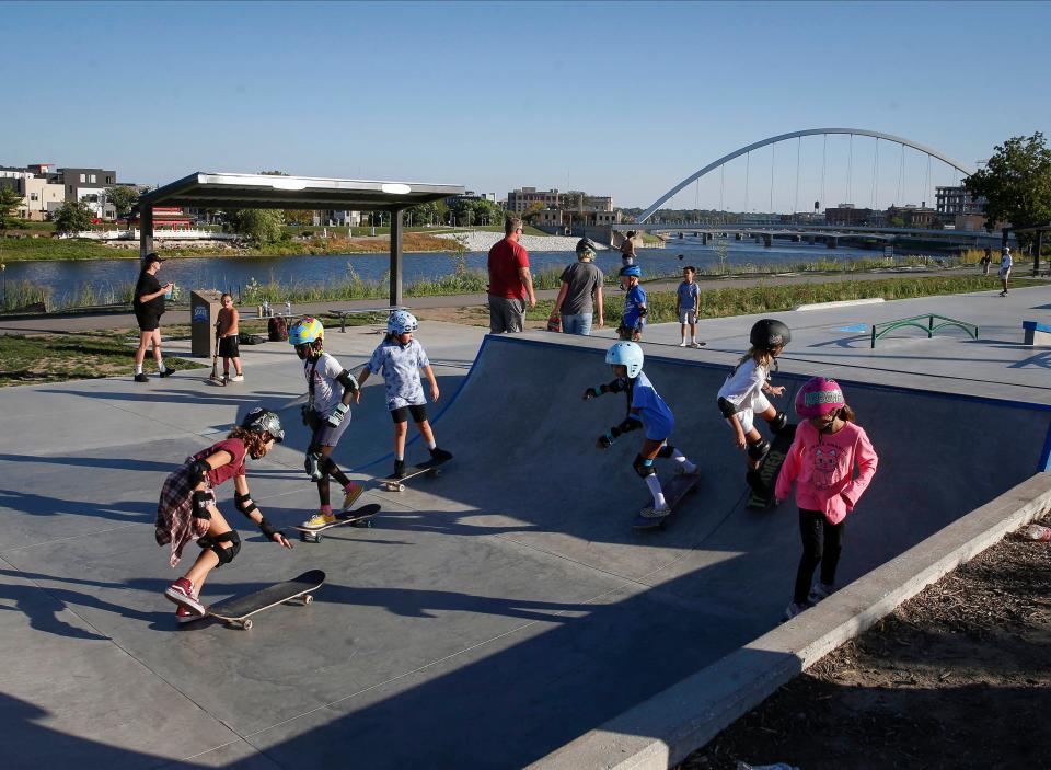 Members of the Subsect Kids Skate Crew ride their skateboards at the Lauridsen Skatepark in Des Moines on Tuesday, Sept. 7, 2021.