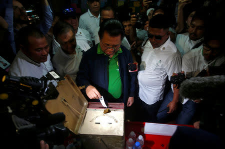 Ebrahim Murad, Chairman of the Moro Islamic Liberation Front (MILF), casts his vote during the plebiscite on the Bangsamoro Organic Law (BOL) at a voting precinct in Sultan Kudarat, Maguindanao province, Philippines January 21, 2019. REUTERS/Marconi B. Navales