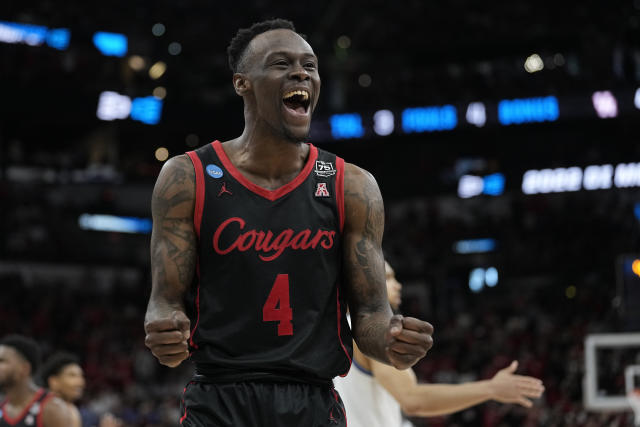 Houston guard Taze Moore celebrates after scoring against Villanova during the second half of a college basketball game in the Elite Eight round of the NCAA tournament on Saturday, March 26, 2022, in San Antonio. (AP Photo/David J. Phillip)