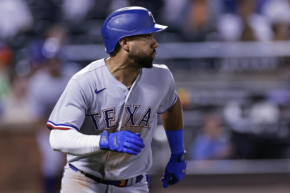 Texas Rangers' Ezequiel Duran watches his RBI single against the New York Mets during the ninth inning of a baseball game Tuesday, Aug. 29, 2023, in New York. (AP Photo/Adam Hunger)