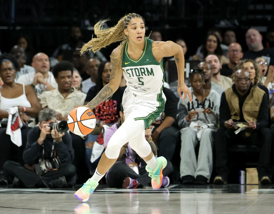 LAS VEGAS, NEVADA - SEPTEMBER 22: Gabby Williams #5 of the Seattle Storm brings the ball up the court against the Las Vegas Aces in the first quarter of Game One of the 2024 WNBA Playoffs first round at Michelob ULTRA Arena on September 22, 2024 in Las Vegas, Nevada. The Aces defeated the Storm 78-67. NOTE TO USER: User expressly acknowledges and agrees that, by downloading and or using this photograph, User is consenting to the terms and conditions of the Getty Images License Agreement. (Photo by Ethan Miller/Getty Images)