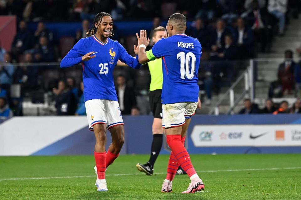 Mbappe celebrates with Barcola before Euro 2024 (AFP via Getty Images)