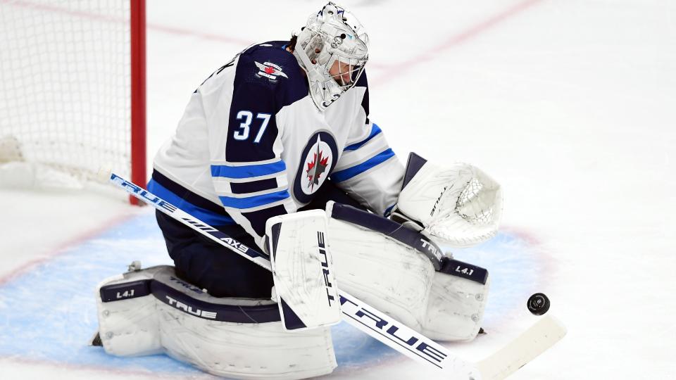 First place is taken, but Connor Hellebuyck is in the mix for second-best goalie in the NHL. (Getty)