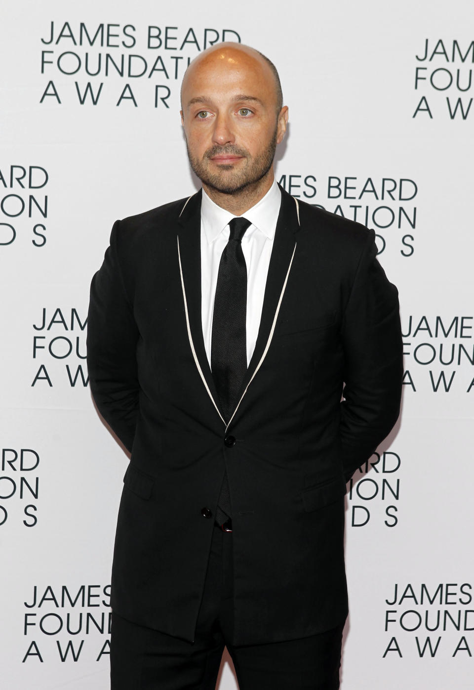 Chef Joe Bastianich arrives for the James Beard Foundation Awards, Monday, May 7, 2012, in New York. (AP Photo/Jason DeCrow)