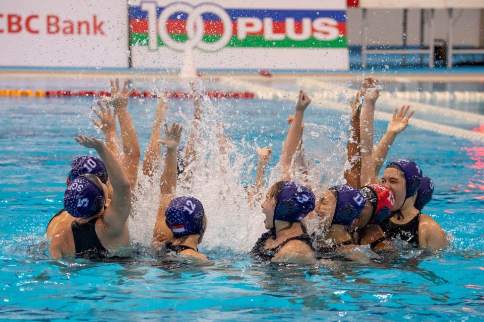 The Singapore women's A team celebrate defeating Thailand to win the Water Polo Inter-Nations Cup women's title. (PHOTO: Singapore Swimming Association)