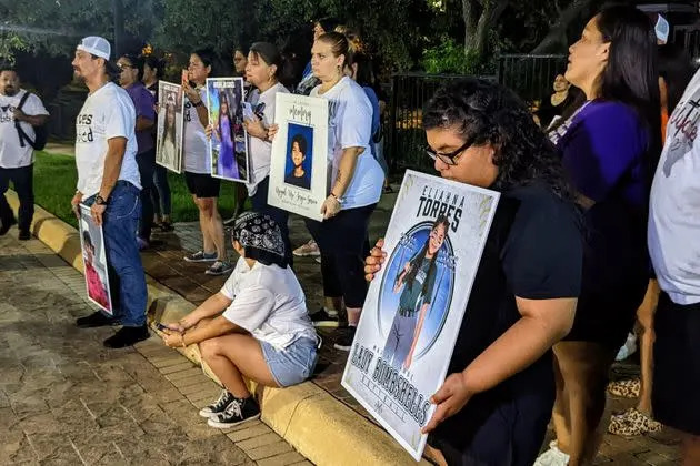 Parents of children who died in the May 24 school shooting in Uvalde stand outside the governor's mansion in Austin, Texas, on Saturday, Aug. 27. (Photo: Roque Planas/HuffPost)