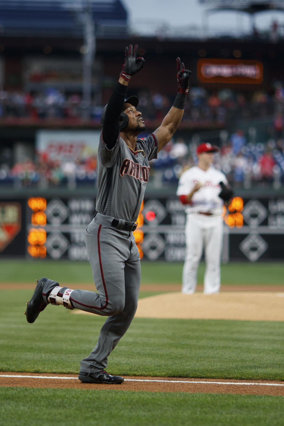 Arizona Diamondbacks' Jarrod Dyson, left, reacts as he rounds the bases after hitting a home run off Philadelphia Phillies starting pitcher Jerad Eickhoff during the first inning of a baseball game, Monday, June 10, 2019, in Philadelphia. (AP Photo/Matt Slocum)