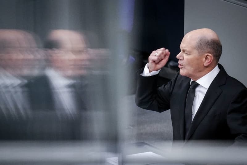German Chancellor Olaf Scholz speaks in the Bundestag in the general debate on the budget of the German Chancellor and Chancellery. Kay Nietfeld/dpa