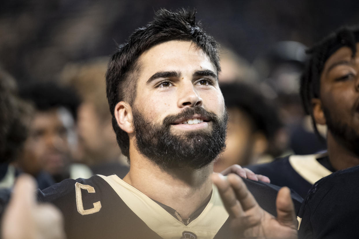 Wake Forest quarterback Sam Hartman (10) smiles after defeating Duke in an NCAA college football game on Saturday, Oct. 30, 2021, in Winston-Salem, N.C. (AP Photo/Matt Kelley)