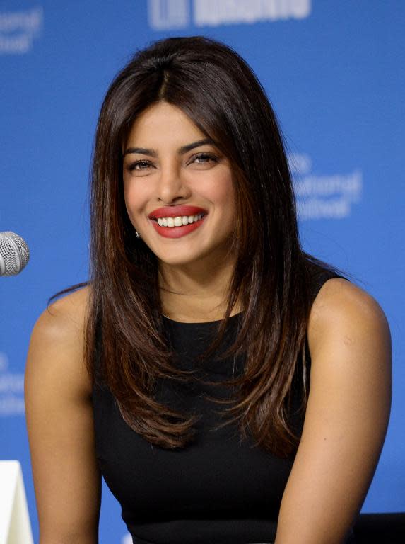 Indian actress Priyanka Chopra speaks onstage at the 'Mary Kom' press conference, during the Toronto International Film Festival, at TIFF Bell Lightbox, on September 4, 2014