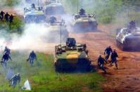 File photo shows Chinese People's Liberation Army (PLA) marines taking part in a military exercise in southern China. China is the sixth largest world exporter of weapons behind the United States, Russia, Germany, France and Britain