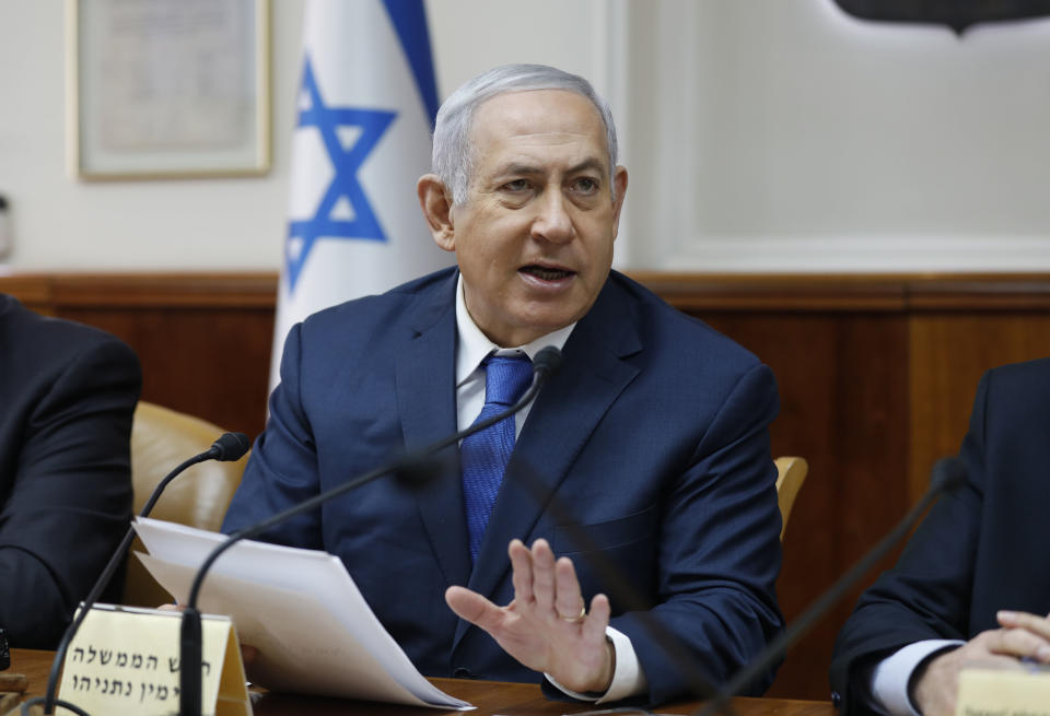 Israeli Prime Minister Benjamin Netanyahu chairs the weekly cabinet meeting at his office in Jerusalem, Sunday, Dec. 16, 2018. (Abir Sultan/Pool Photo via AP)