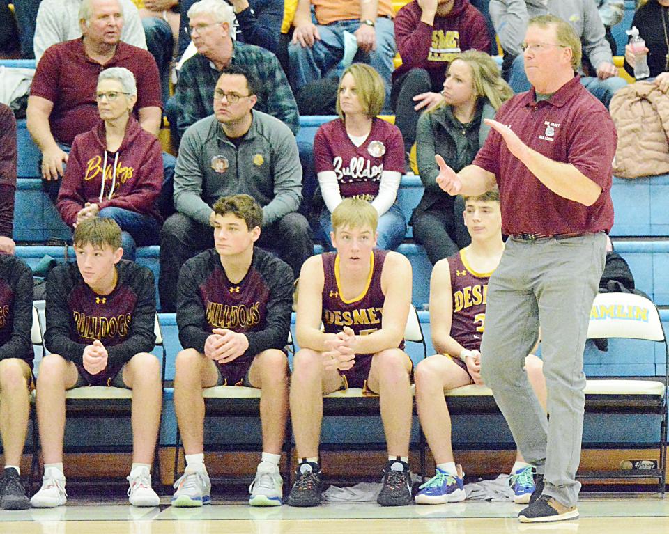 De Smet head coach Jeff Gruenhagen offers up some encouragement during a Lake Central Conference high school basketball doubleheader on Tuesday, Jan. 17, 2023 at the Hamlin Education Center.