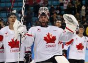 Ice Hockey - Pyeongchang 2018 Winter Olympics - Men's Bronze Medal Match - Czech Republic v Canada - Gangneung Hockey Centre, Gangneung, South Korea - February 24, 2018 - Goalie Kevin Poulin of Canada celebrates with teammates following their bronze medal victory. REUTERS/Kim Kyung-Hoon