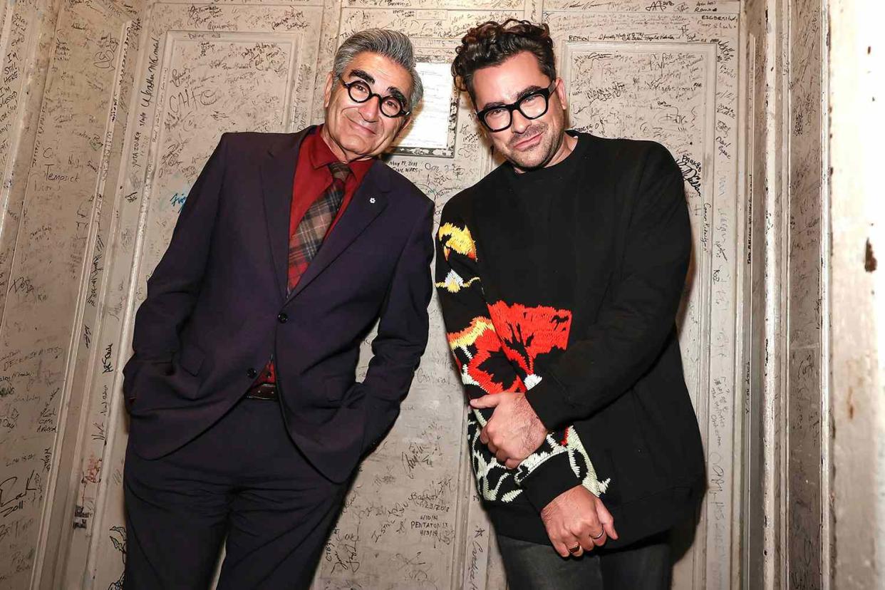 <p>Arturo Holmes/Getty</p> Eugene Levy (left) and Dan Levy